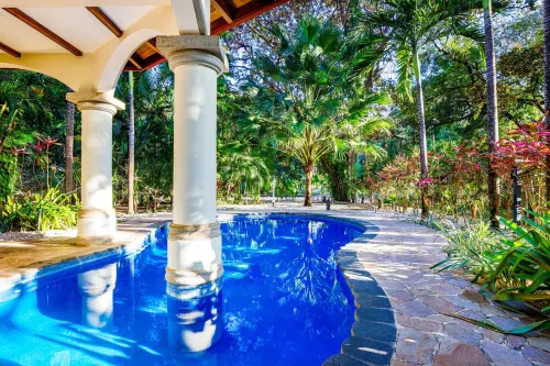 Beachfront Gated Retreat with Coastal Charm