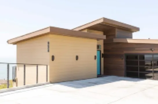 Sky House • Boutique seaside retreat with cinema room and spa