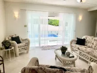 Tranquil 3 bedroom garden-view unit with direct access to the pool
