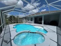 Modern and spacious getaway with a pool and grill