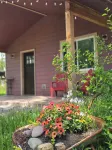Themed Bear's Den Cabin__nestled in the pines minutes outside of Glacier Park.
