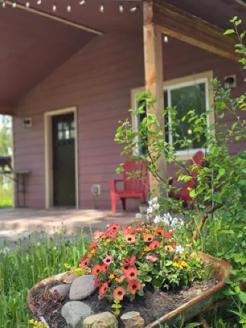 Themed Bear's Den Cabin__nestled in the pines minutes outside of Glacier Park.
