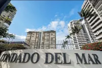 Beachfront Oceanview 2-suite condo with balcony, AC, WiFi, Pool, Fitness Room