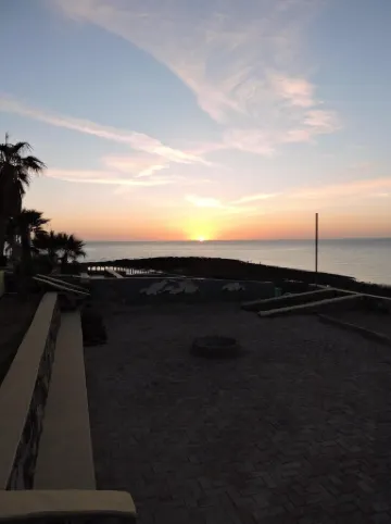 2 bed,2 bath upper condo only steps from the beach. 360 degree views.of ocean!