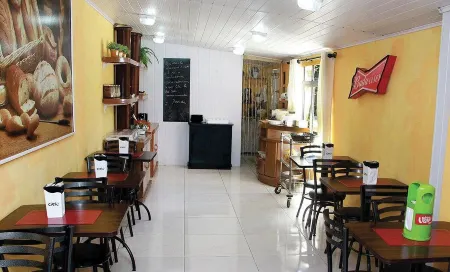 Villa Tata Suítes Ltda Отели рядом с достопримечательностью «Botanical Garden of Curitiba»