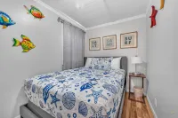 Cozy Cottage with Deck and Fireplace - Charming Coastal Escape