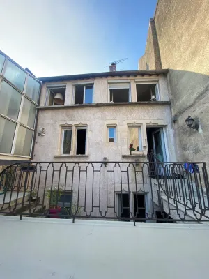 Historic house on rue Pasteur with terrace overlooking Dole's Little Venice Hotels in Dole