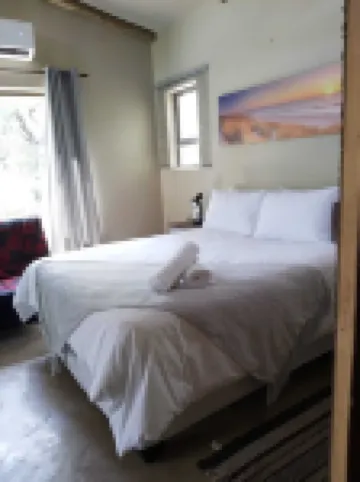 Kruger Shiringa holiday Home, with three unique en-suite separate chalet.