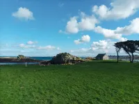 Recent house facing the dunes and Grève Blanche beach, at the foot of the GR34.