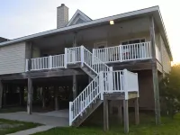 One level 4 Bedroom House with Pool, Large Docks, Canal Access - The Turtle Club Hotels in Kinnakeet
