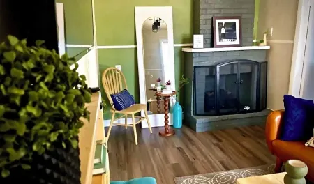 Step into a serene stay where electric charm meets cozy coastal tranquility.