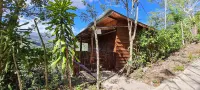 Cozy cabaña overlooking a beautiful valley. Finca Fajardo Lodge. Rustic Cabin#1