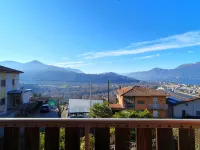 House in Luino with Green Garden and City Views