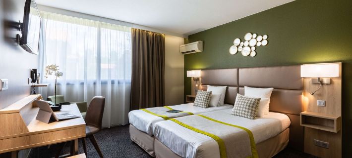 Kyriad Prestige Bordeaux Aeroport Отели в г. Мериньяк
