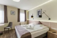 Amstel Hattyú Panzió -Érintésmentes bejelentkezés