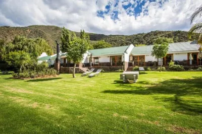 Old Mill Lodge, Seasonal Working Ostrich Farm & Restaurant, Oudtshoorn Hotels near C.P Nel Museum