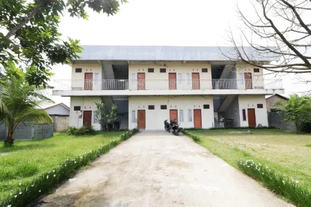 Krisna Hostel Отели в г. Percut Sei Tuan