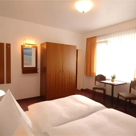 Haus Sparkuhl Hotel Garni Отели рядом с достопримечательностью «Ботанический сад «Берггартен»»