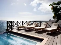 Scuba Lodge & Suites - de playa