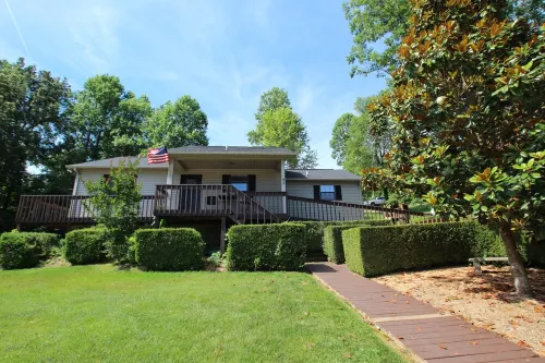 Newly remodeled,  handicap accessible overlooking pool , play area