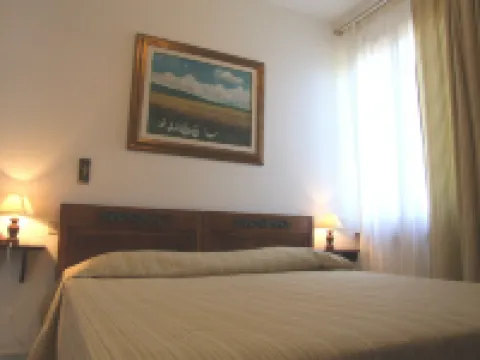 Large and very well furnished apartment in a villa, with garden and pool. D.