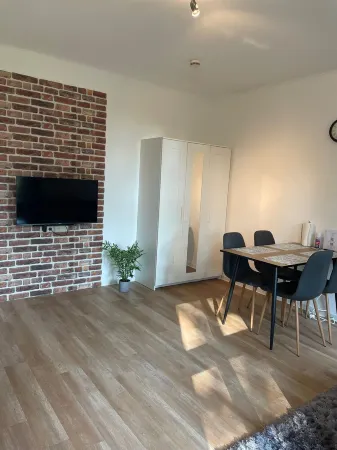 Cozy studio with a view of the spa garden Отели в г. Бад-Ротенфельде