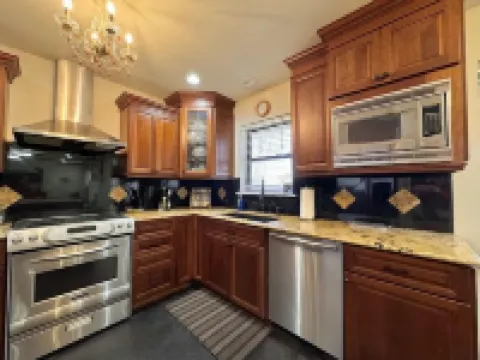 Centrally Located, La Bella , is a well appointed home in a quiet neighborhood