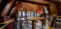 Private lakeside A-frame cabin w/ hot tub, beach, docks, games... 4 season fun!