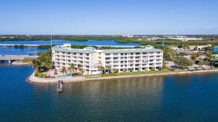 Top-Floor Waterfront Condo with Bay View + Pool and Hot Tub