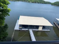 Lake house with three decks private dock and swim platform.