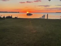 Waterfront house with sandy beach near downtown Hotels in Roscommon County