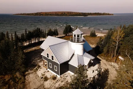 Bois Blanc Island Lighthouse Home. Iconic Sunset Views of the Mackinac Bridge!