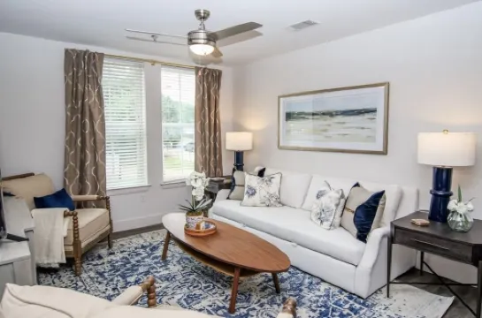 Walk to the square and the grove! This 2BR 2BA is the perfect location.