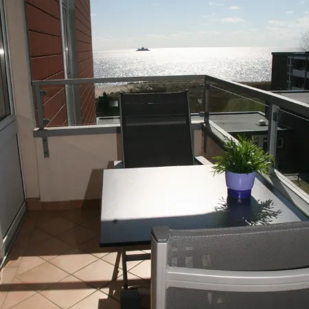 directly on the beach, balcony overlooking the sea, beach chair, close to the golf course