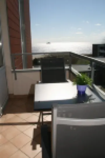 directly on the beach, balcony overlooking the sea, beach chair, close to the golf course