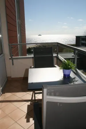 directly on the beach, balcony overlooking the sea, beach chair, close to the golf course