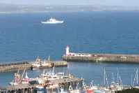 Beautiful views over Mounts Bay. Cosy flat in the fishing village of Newlyn