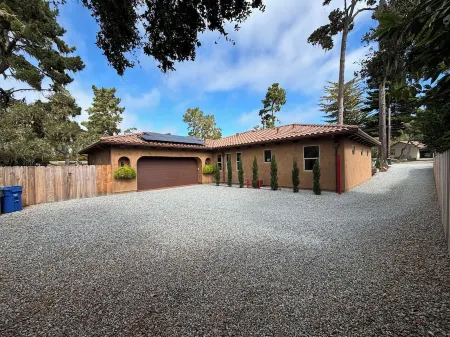 New 2,638 sf custom built Tuscan Style home in Pebble Beach.