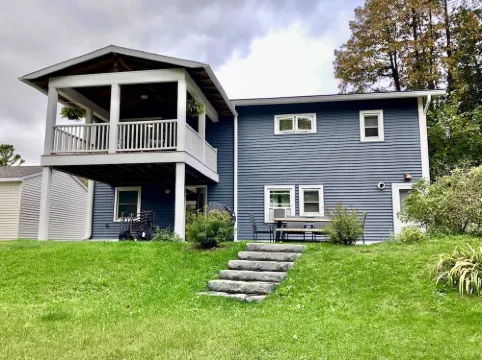 Second floor unit close to downtown Beulah & Crystal Lake for year-round fun!