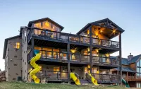 The "Big House" with.. Indoor Basketball, Trampoline and Play set, Theater Room