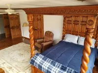 Historic Limestone House in park setting in Ozarks