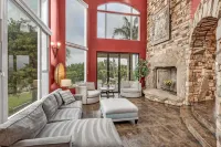 Castle on a hill, breathtaking views, surrounded with pools, trees, and lawn