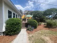 Coastal Cottage across from the beach. Pet friendly! Fully fenced in yard. Hotels near Public Beach Access - 3rd St.W