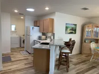 Screened Lanai and Golf Cart - Inviting Cozy Retreat