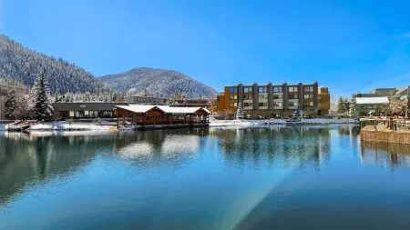 Chic Condo with Stunning Lake and Mountain Views - Inviting Escape