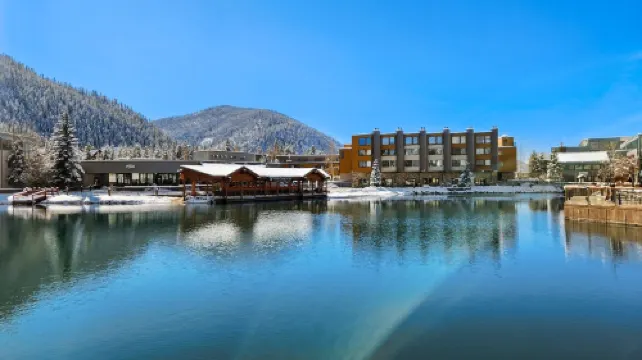 Chic Condo with Stunning Lake and Mountain Views - Inviting Escape