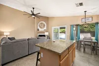 Expansive Backyard Oasis with Pool and Waterslide - Inviting Escape