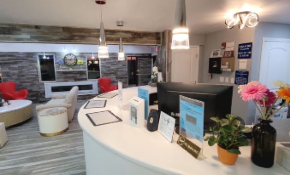 Dragonfly Inn & Suites - Housity