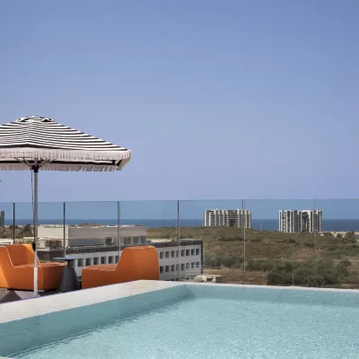Publica Isrotel, Autograph Collection Hoteles cerca de Playa Hof HaTzuk