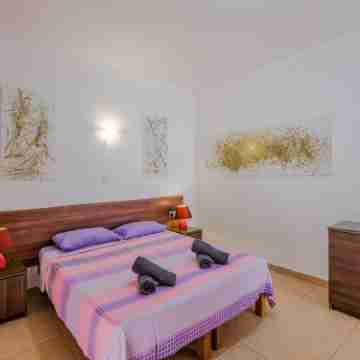 Blue Harbour Seafront Penthouse with Large Terrace with Panoramic Sea Views - by Getawaysmalta Rooms